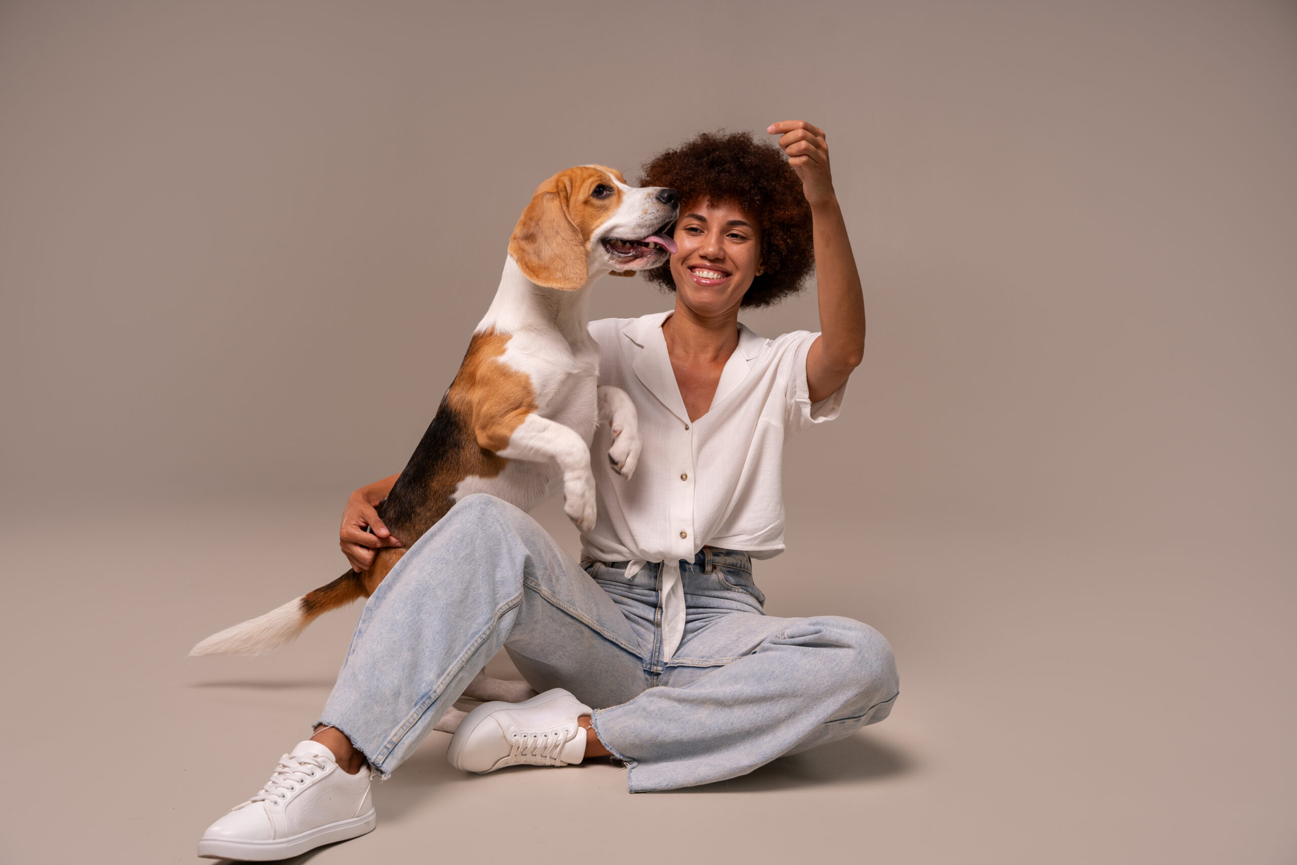 full-shot-woman-with-dog-studio
